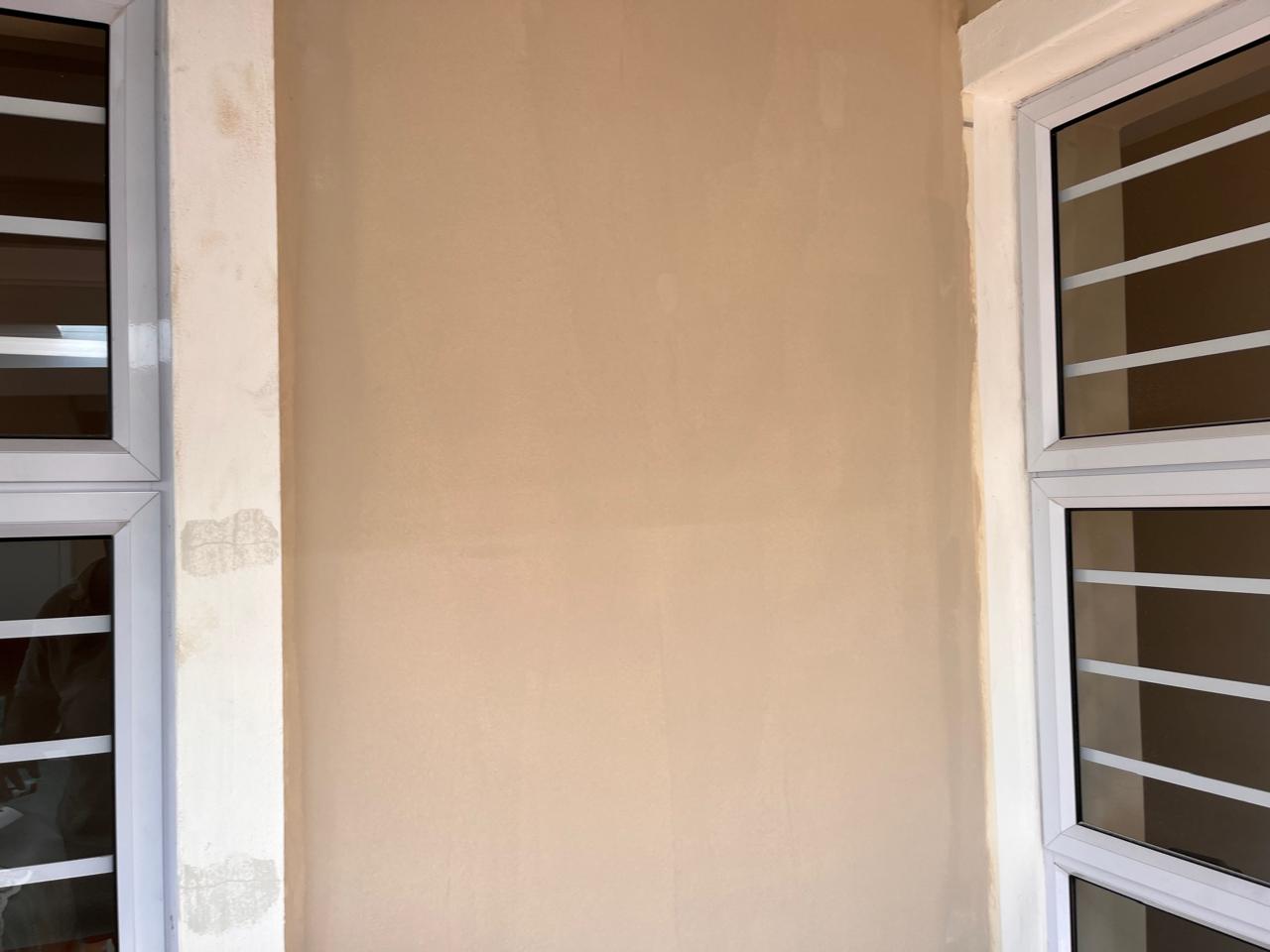 Exterior wall prep — window surround painting