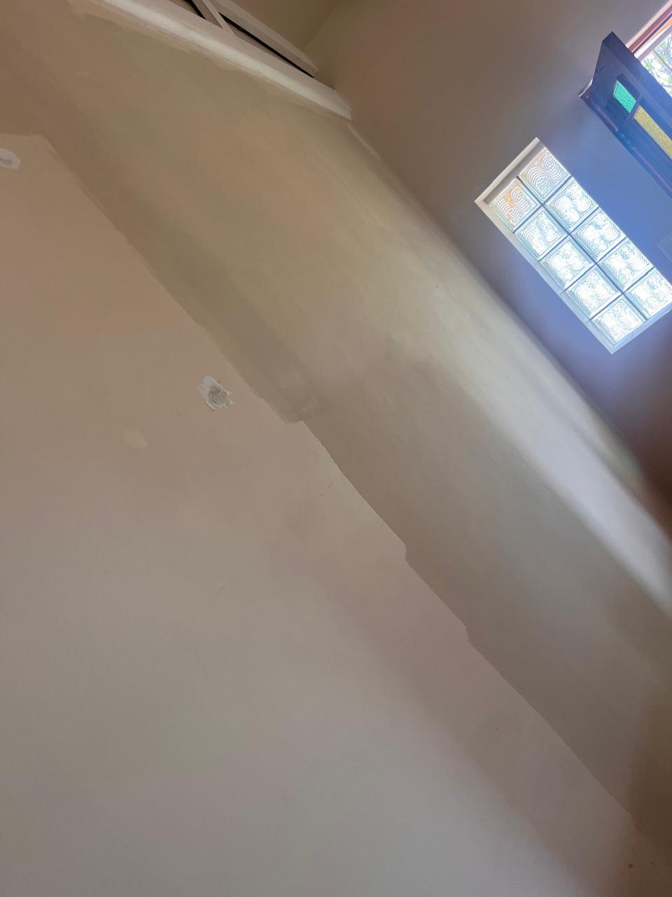 Ceiling line painting in progress